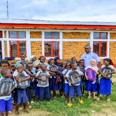 Distribution of school kits to students of EP ABDALAMANGALA in Salamabila 