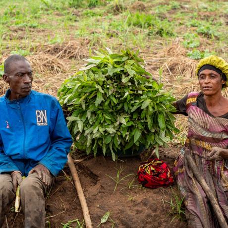 Yohali and her husband farm together in Tabaa, Tanganyika, to increase production and support their family of ten children. After selling part of her harvest, Yohali saves through a Village Savings and Loan Association (VSLA) to help cover school fees and household needs. Like many women in eastern DRC, she balances farming, savings activities and unpaid care work—illustrating the double burden behind women’s economic empowerment.