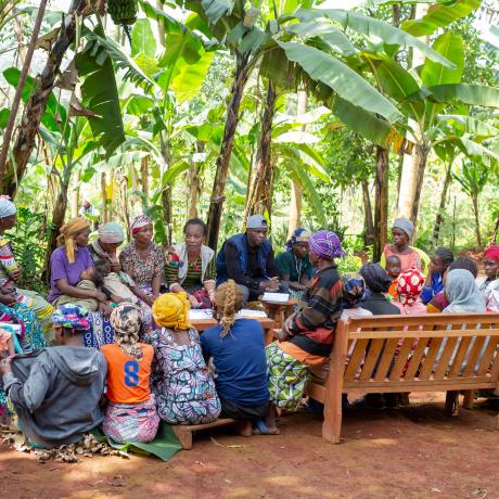 ActionAid RDC team members engaging with farmers and community members during a Community Scorecard meeting for the participatory evaluation of the GAFSP-supported project in Walungu, South Kivu, DRC.