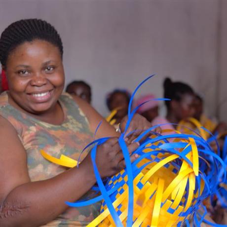 Brigitte indulges in weaving baskets to earn income 
