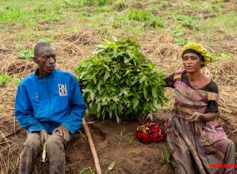 Yohali and her husband farm together in Tabaa, Tanganyika, to increase production and support their family of ten children. After selling part of her harvest, Yohali saves through a Village Savings and Loan Association (VSLA) to help cover school fees and household needs. Like many women in eastern DRC, she balances farming, savings activities and unpaid care work—illustrating the double burden behind women’s economic empowerment.