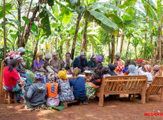 ActionAid RDC team members engaging with farmers and community members during a Community Scorecard meeting for the participatory evaluation of the GAFSP-supported project in Walungu, South Kivu, DRC.